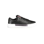 Black leather women's sneaker by Tommy Hilfiger with white sole and classic branding, stylish and comfortable footwear.