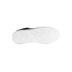 Black leather women's sneaker from Tommy Hilfiger with white sole and subtle branding, stylish and comfortable footwear.