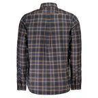 Timberland blue cotton men's shirt displayed on a hanger, showcasing its classic design and button-down collar.