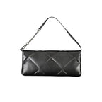 Calvin Klein black polyester women's handbag with sleek design and top handle, featuring minimalist style and subtle branding.
