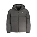 Tommy Hilfiger black polyester men's jacket displayed on a hanger, featuring a sleek design and classic style.