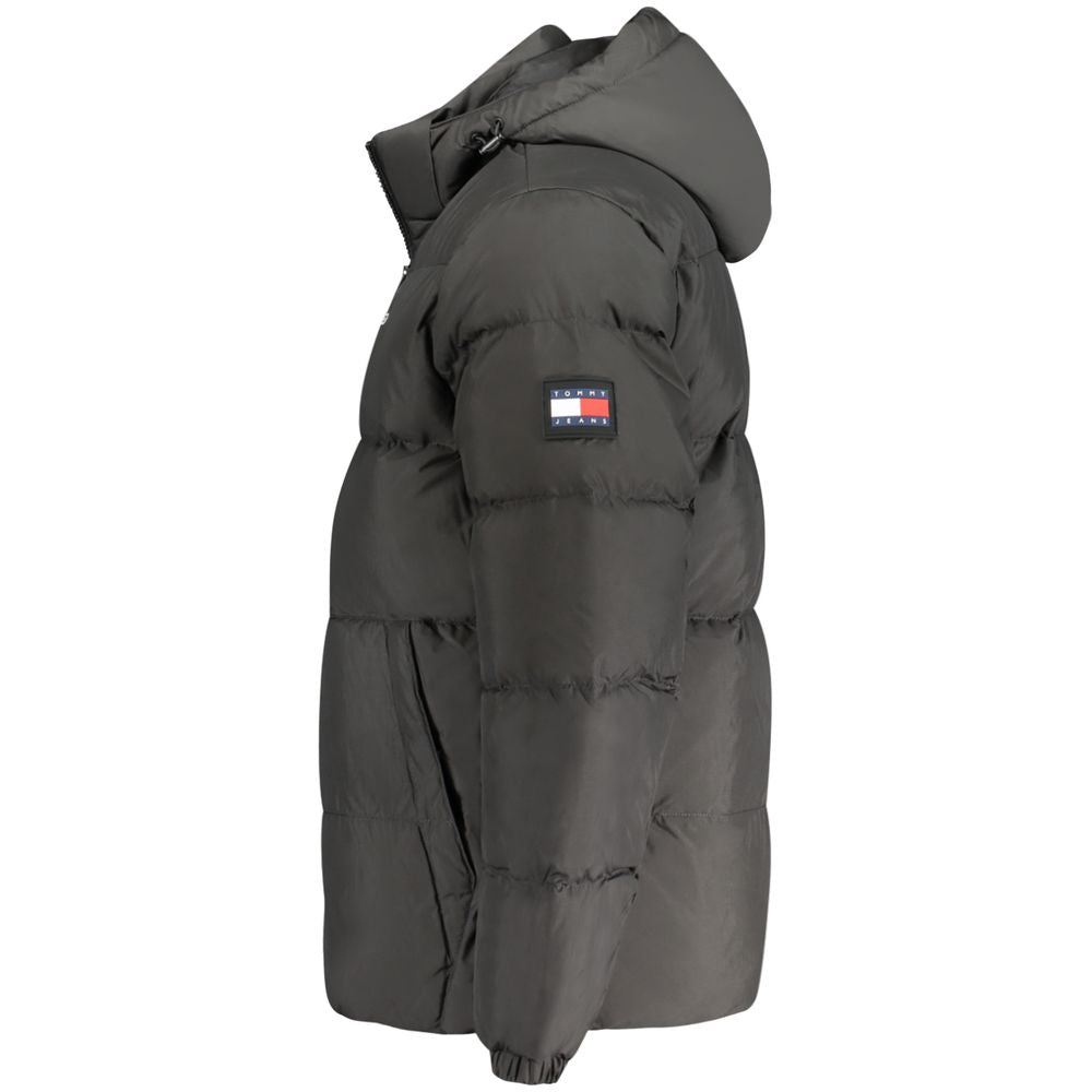 Black polyester men's jacket by Tommy Hilfiger with a sleek design and classic logo detail.