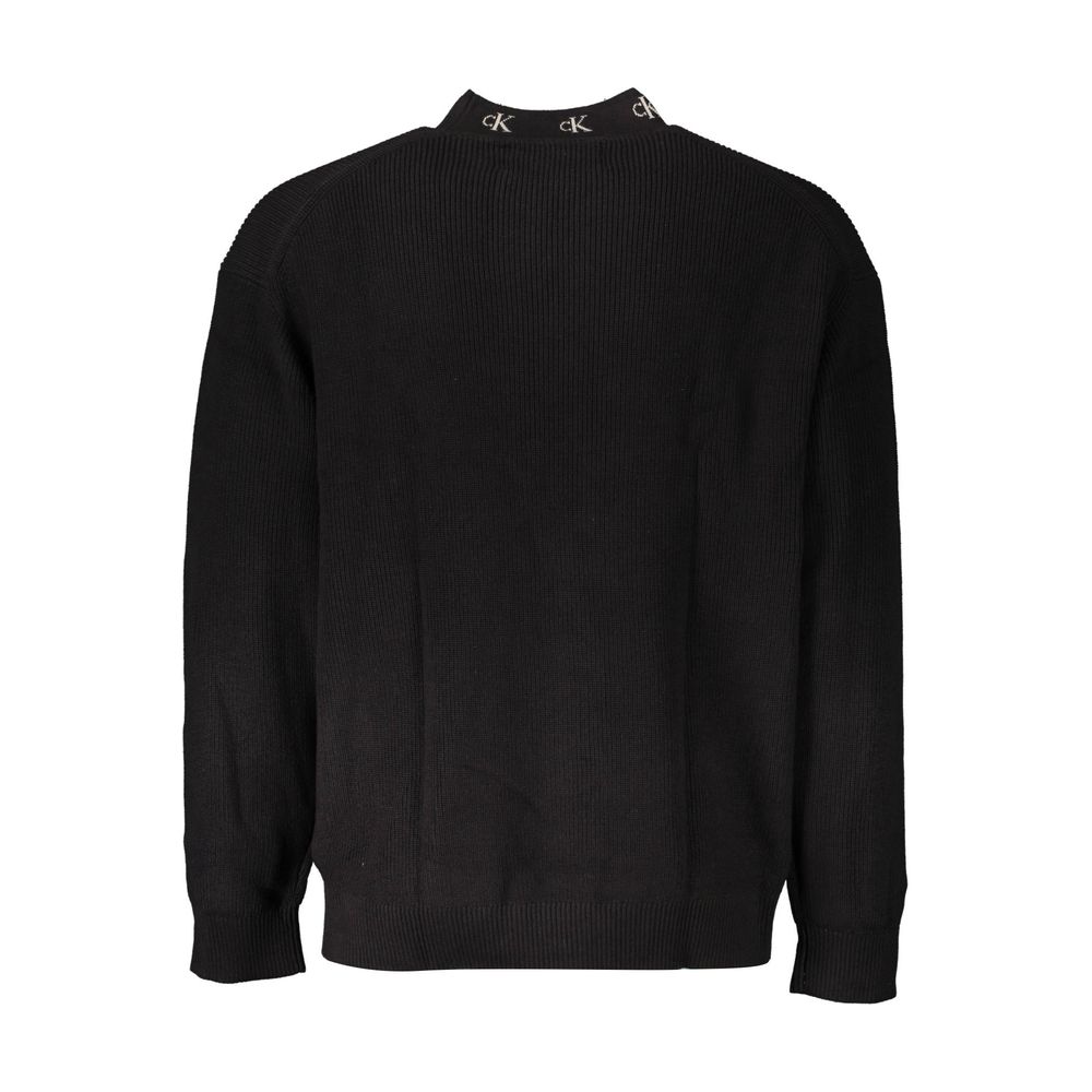 Calvin Klein Nero Cotton men's sweater with crew neck and long sleeves, in black, displayed on a hanger.