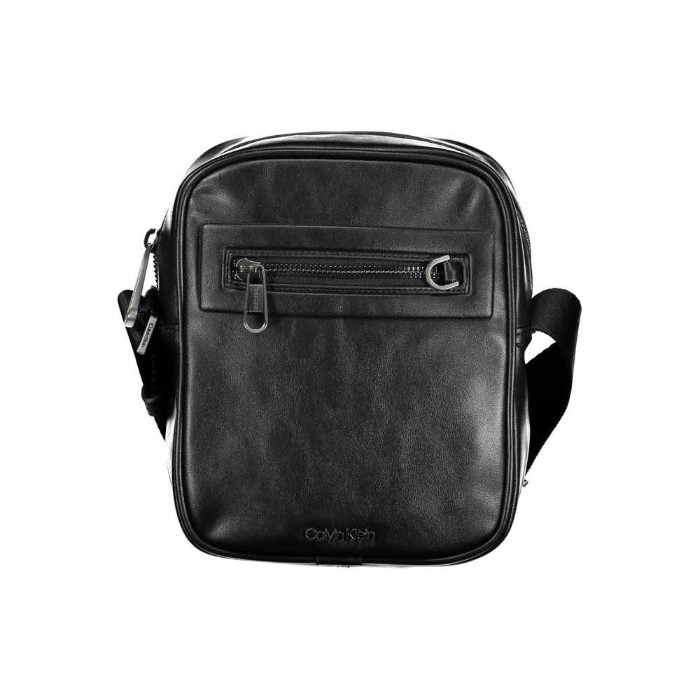Calvin Klein sleek urban black shoulder bag with adjustable strap and minimalist design, perfect for everyday use.