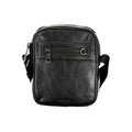 Calvin Klein sleek urban black shoulder bag with adjustable strap and minimalist design, perfect for everyday use.