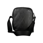 Calvin Klein sleek urban black shoulder bag with adjustable strap and minimalist design, perfect for everyday use.