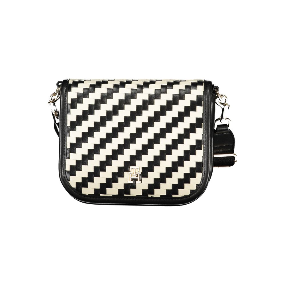 Black Tommy Hilfiger women's handbag made of smooth polyurethane, featuring a sleek design and stylish gold-tone hardware.