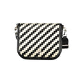 Black Tommy Hilfiger women's handbag made of smooth polyurethane, featuring a sleek design and stylish gold-tone hardware.