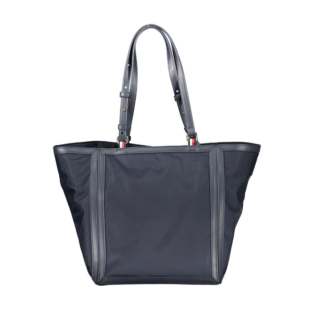 Tommy Hilfiger blue polyester women's handbag with top handles and silver hardware, featuring a classic and stylish design.
