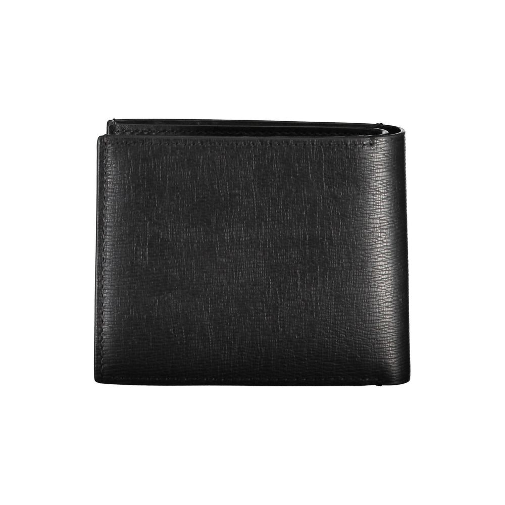 Calvin Klein sleek bifold wallet with RFID protection, featuring classic design and multiple card slots on smooth leather surface.
