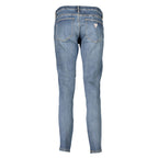 Guess Jeans women's blue cotton skinny jeans, close-up of fitted denim with classic five-pocket design and subtle stitching.