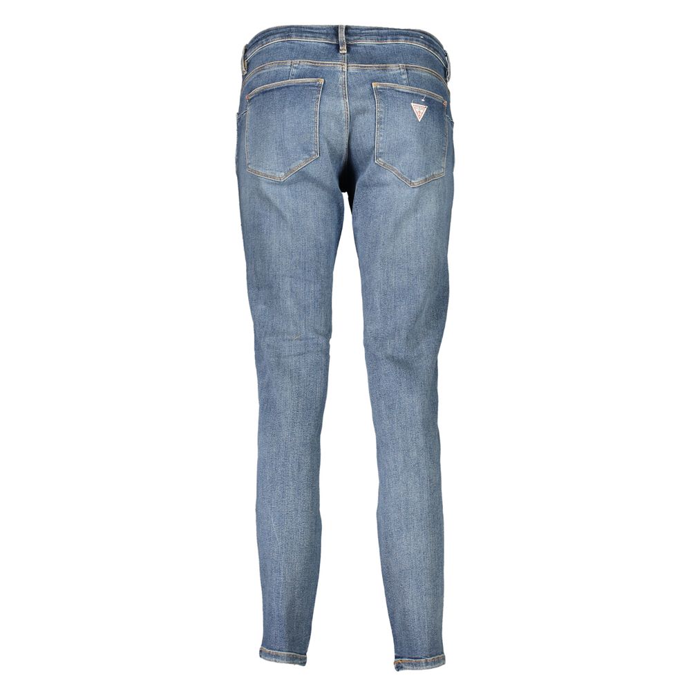 Guess Jeans women's blue cotton skinny jeans, close-up of fitted denim with classic five-pocket design and subtle stitching.