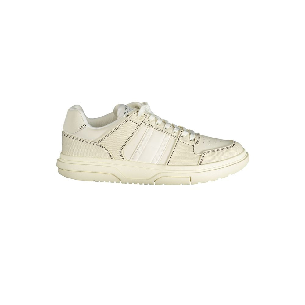 Tommy Hilfiger white polyurethane men's sneaker with laces and logo detail on side, casual athletic footwear.