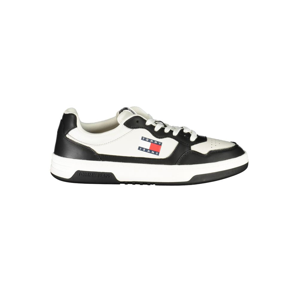 Black Tommy Hilfiger men's polyurethane sneaker with sleek design and white sole, showcasing a modern casual footwear style.