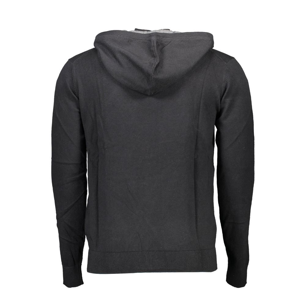 Black cotton men's sweater by U.S. POLO ASSN., featuring a classic crew neck and ribbed cuffs.