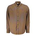 Timberland blue cotton men's shirt displayed on a hanger, featuring a classic button-up design with a collar and long sleeves.