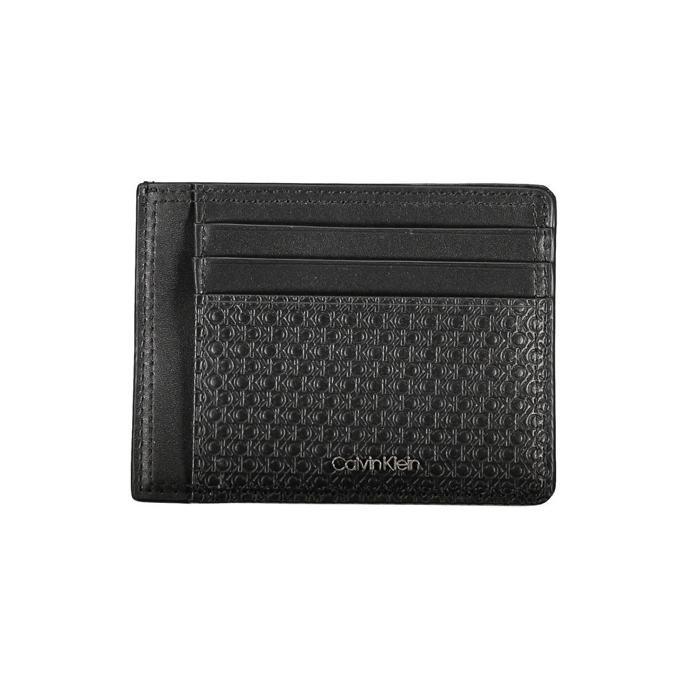 Calvin Klein sleek black leather coin purse with integrated card holder, compact and stylish for everyday use.