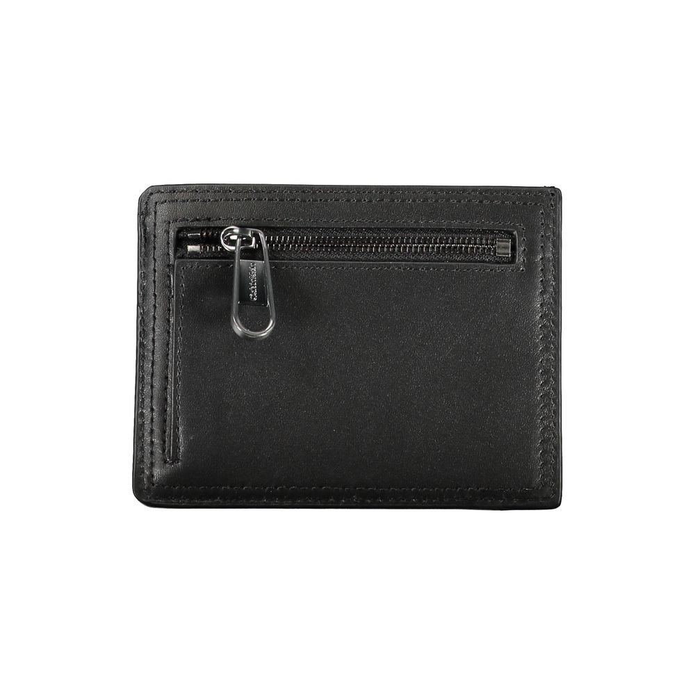Calvin Klein sleek black leather coin purse with integrated card holder, compact accessory for cards and small essentials.