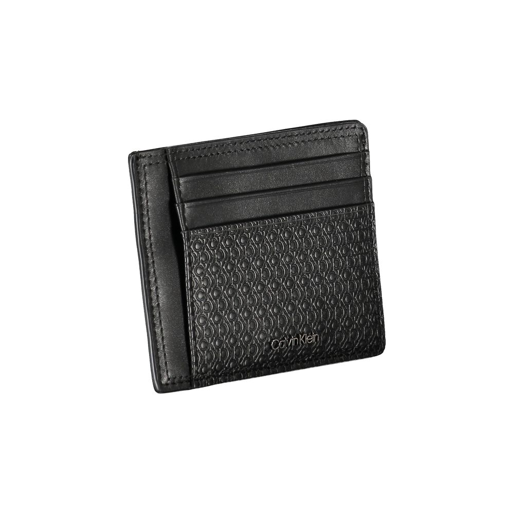 Calvin Klein black leather coin purse with integrated card holder, sleek compact design, perfect for everyday organization.