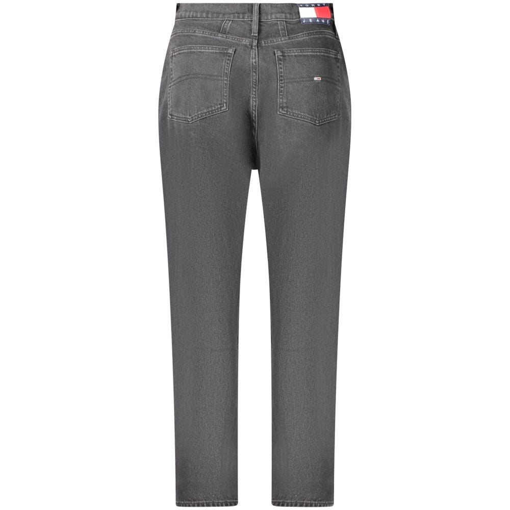 Tommy Hilfiger Nero cotton women's jeans with classic five-pocket design and slim fit style, shown folded on a white background.
