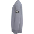 Calvin Klein blue cotton men's sweater with crew neck and long sleeves, soft knit fabric, and ribbed cuffs.