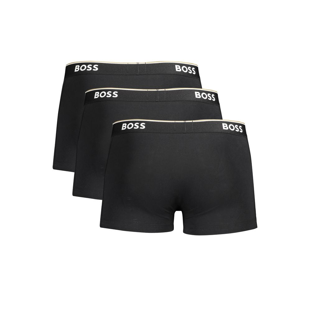 Hugo Boss black cotton men's boxer briefs with elastic waistband and classic fit, showcasing smooth fabric and comfortable design.