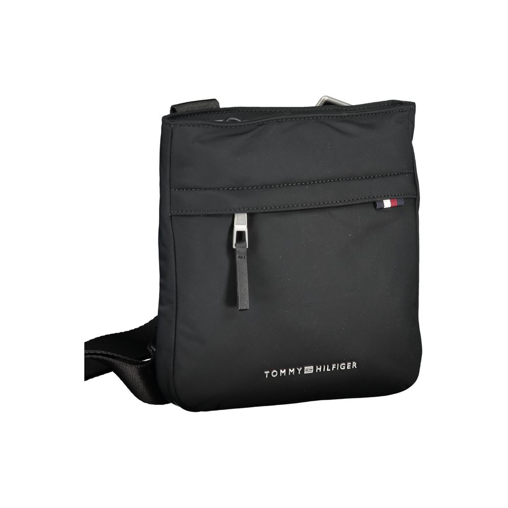 Tommy Hilfiger black polyurethane women’s shoulder bag with sleek design and adjustable strap.