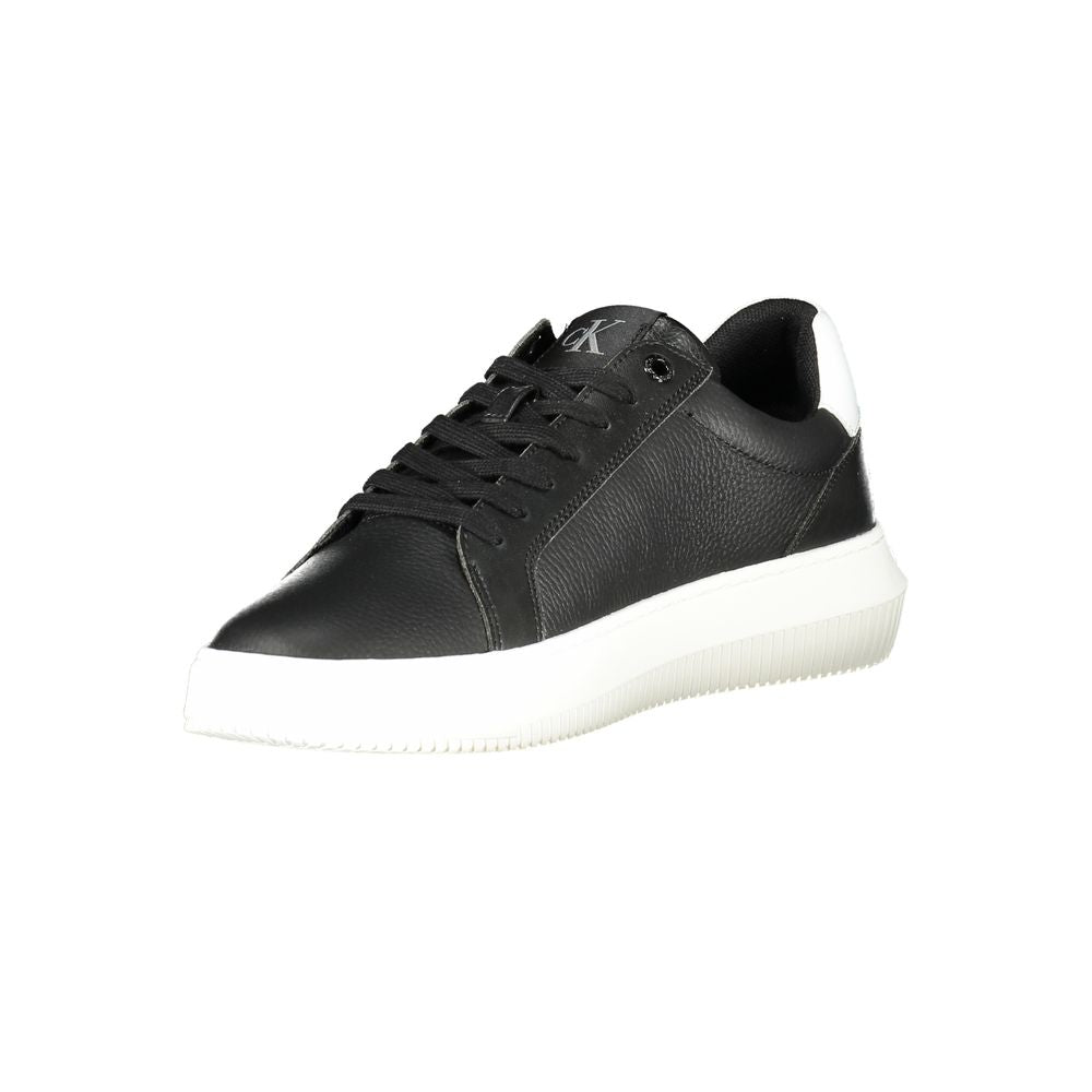 Calvin Klein black leather men's sneaker with sleek design and white sole, showcasing a modern casual footwear style.