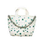 Desigual Bianco Poliuretano women's handbag with sleek design and silver hardware, featuring a top handle and spacious interior.