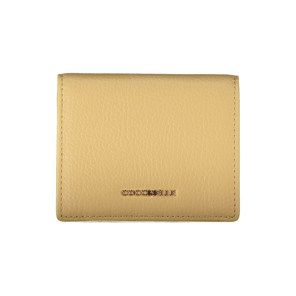 Beige leather women's wallet by Coccinelle featuring a sleek design with multiple card slots and a zip coin compartment.