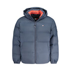 Tommy Hilfiger men's blue polyester jacket displayed on a hanger, featuring a classic design with a front zipper and logo details.