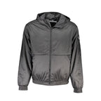 Calvin Klein black men's polyester jacket displayed on a hanger with a sleek, modern design and zippered front.