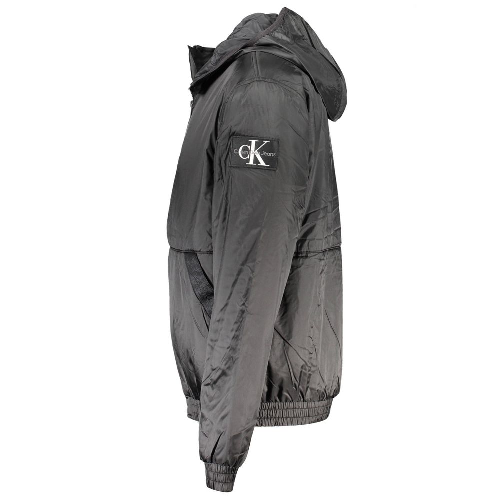 Calvin Klein black men's jacket made of polyester, featuring a sleek design and a front zipper.