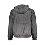 Calvin Klein black polyester men's jacket displayed on a hanger, showcasing its sleek design and modern style.