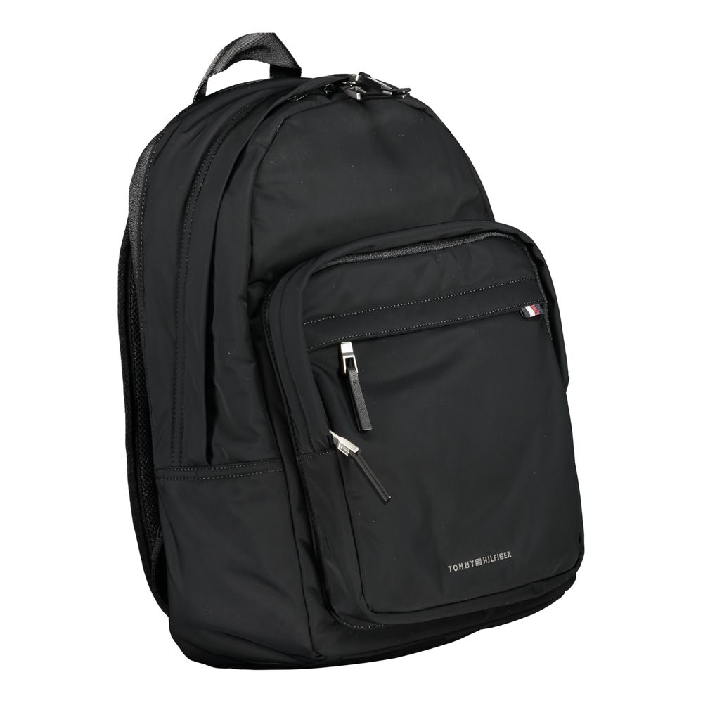 Tommy Hilfiger black polyester men's backpack with adjustable straps and multiple compartments, stylish and functional for everyday use.