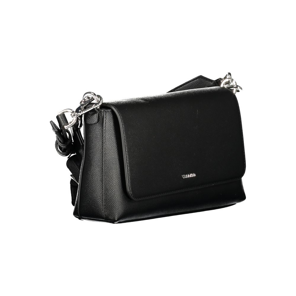 Black Calvin Klein women's handbag made of polyurethane with sleek design and silver hardware, stylish accessory for everyday use.