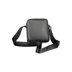 Black Calvin Klein men's shoulder bag made of polyester, featuring a sleek design and adjustable strap.