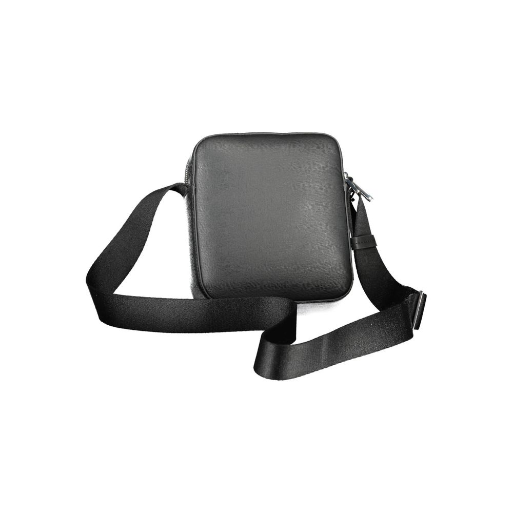Black Calvin Klein men's shoulder bag made of polyester, featuring a sleek design and adjustable strap.