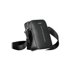 Calvin Klein black polyester men's shoulder bag with adjustable strap and sleek design, suitable for casual or professional use.