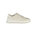 Beige leather women's sneaker by Calvin Klein with white sole and sleek design, showcasing casual and stylish footwear.