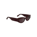 Calvin Klein Rosso acetate women's sunglasses with rounded frames and dark tinted lenses, stylish and fashionable eyewear.