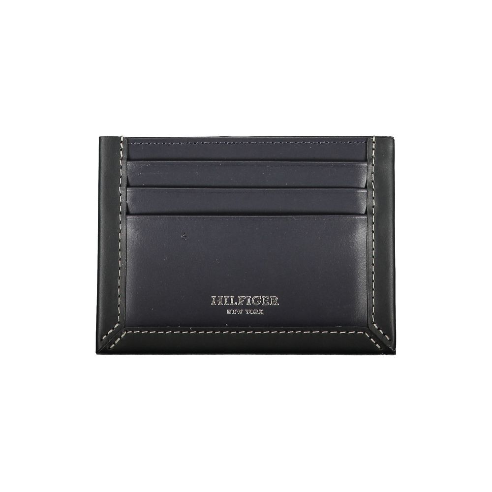 Tommy Hilfiger blue leather men's wallet with multiple card slots and a sleek, classic design.