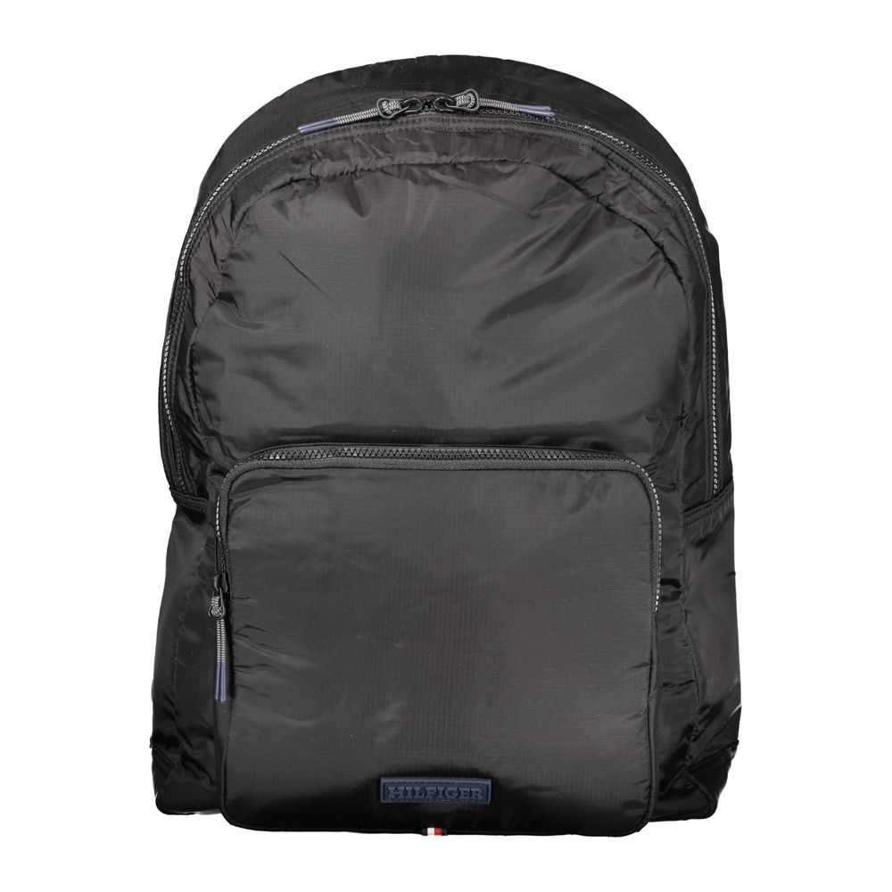 Tommy Hilfiger black polyurethane men's backpack with adjustable straps and multiple compartments, stylish and functional.