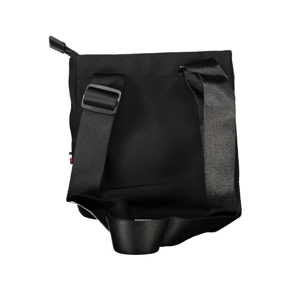 Tommy Hilfiger black polyester men's shoulder bag with adjustable strap and front logo detail.