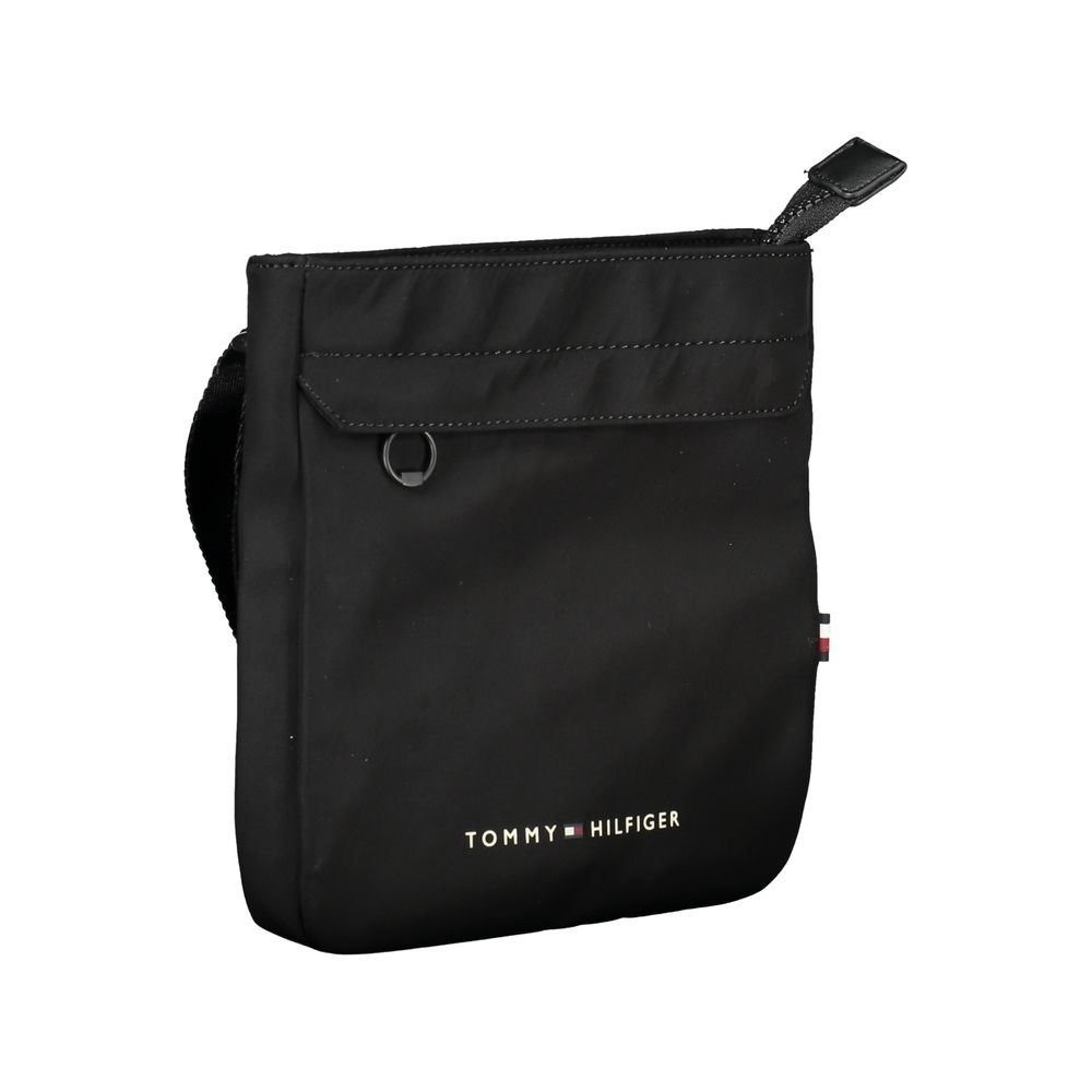 Tommy Hilfiger black polyester men's shoulder bag with adjustable strap and zippered compartments.