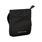 Tommy Hilfiger black polyester men's shoulder bag with adjustable strap and zippered compartments.