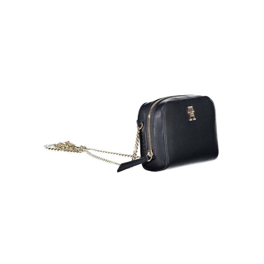 Tommy Hilfiger blue polyurethane women's bag with sleek design and silver hardware, suitable for casual and stylish outings.