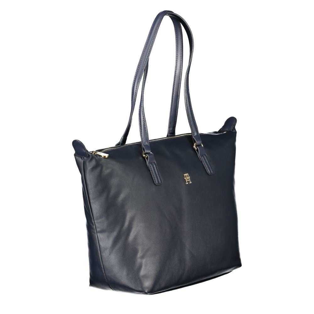 Tommy Hilfiger women’s blue polyester handbag with structured design and top handles, stylish and functional accessory.