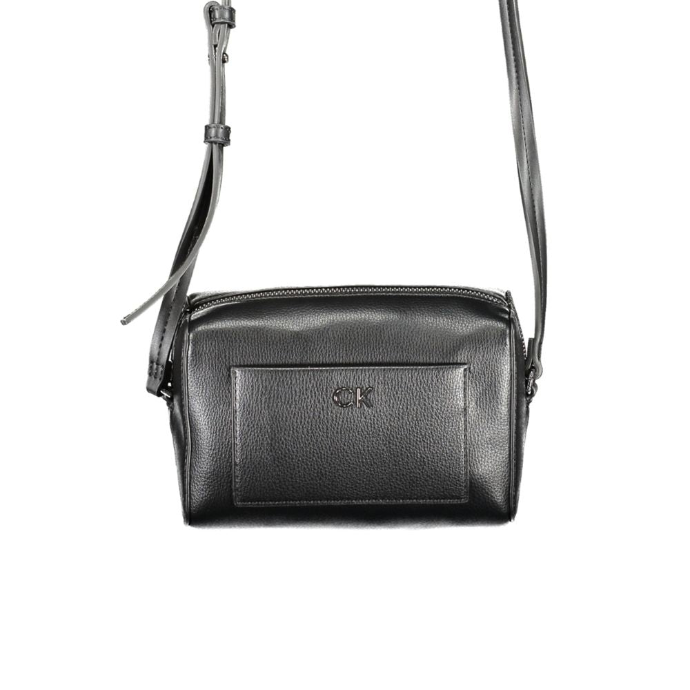 Calvin Klein black polyester women’s shoulder bag with sleek design and adjustable strap, featuring minimalist style and subtle logo accents.