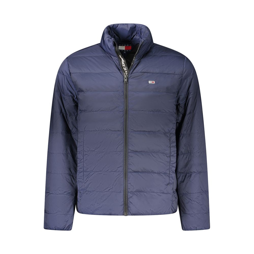 Tommy Hilfiger men's blue polyamide jacket displayed on a hanger, featuring a classic design with a front zipper and collar.